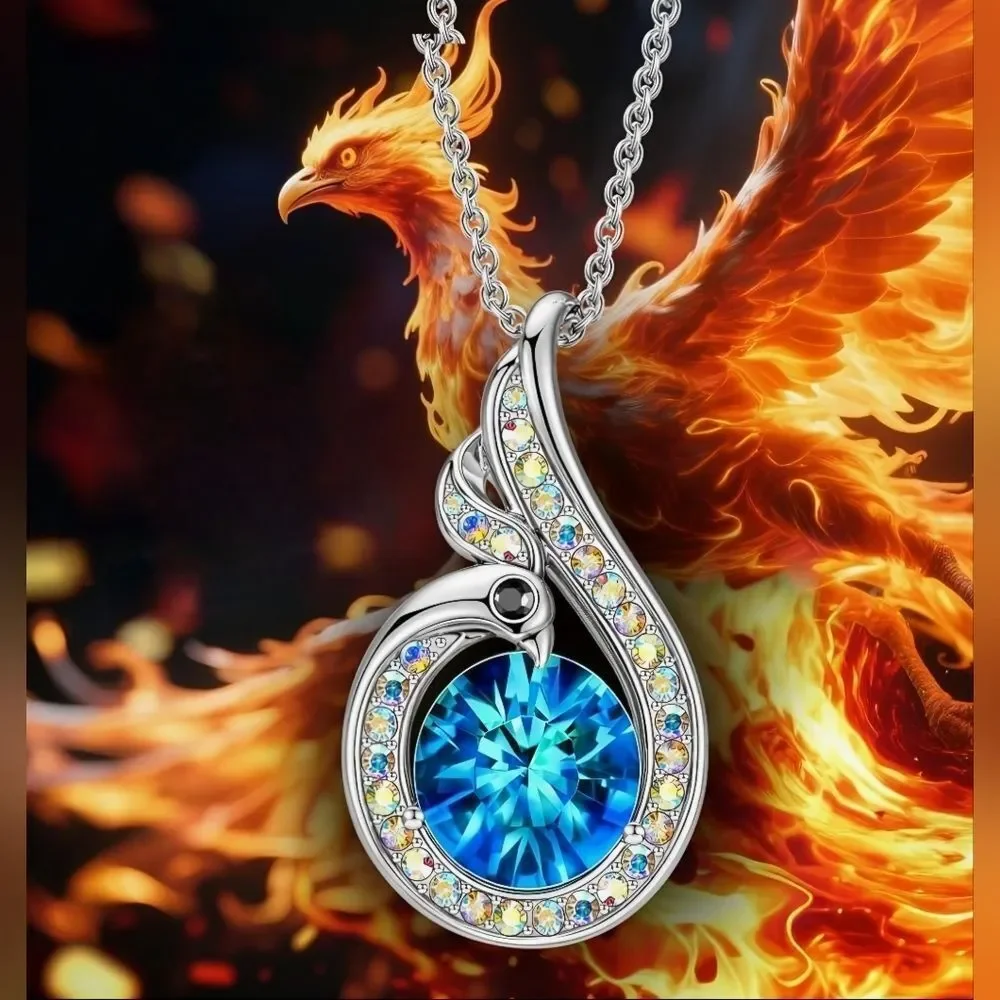 🩵⏭️NIB White Gold Plated Blue Crystal Sapphire Phoenix Pendant Necklace